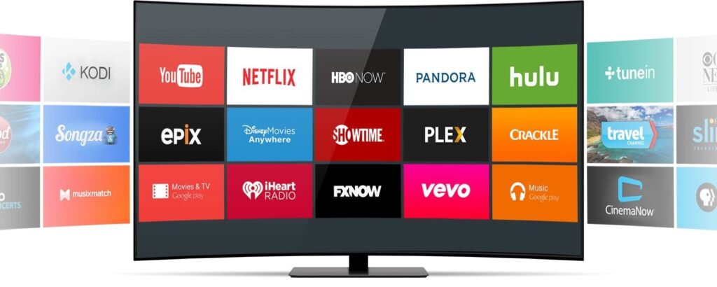 Tela de uma TV moderna exibindo os logotipos de vários serviços de streaming, como Netflix, YouTube e HBO.